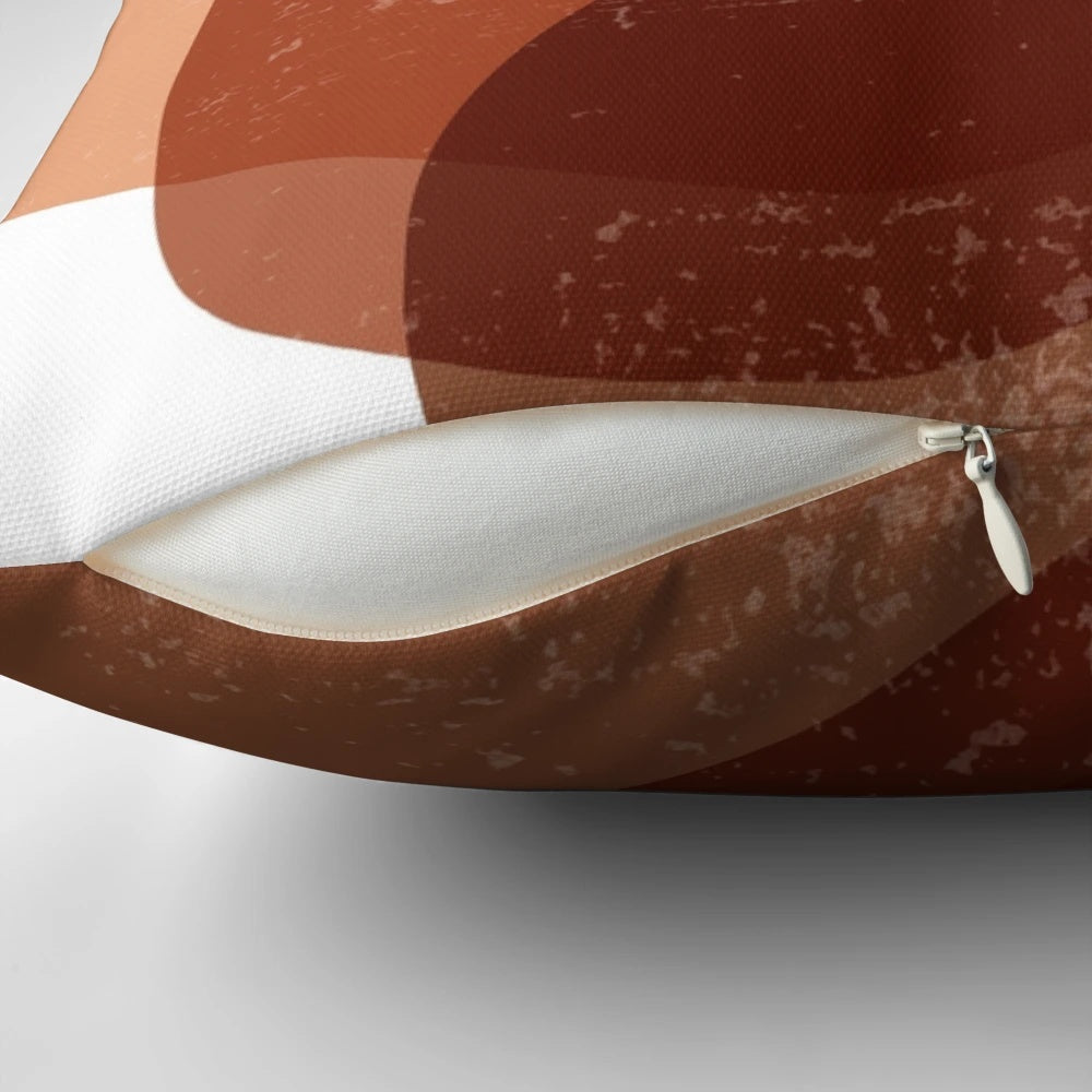 Terracotta abstract art pillow with organic, minimal shapes