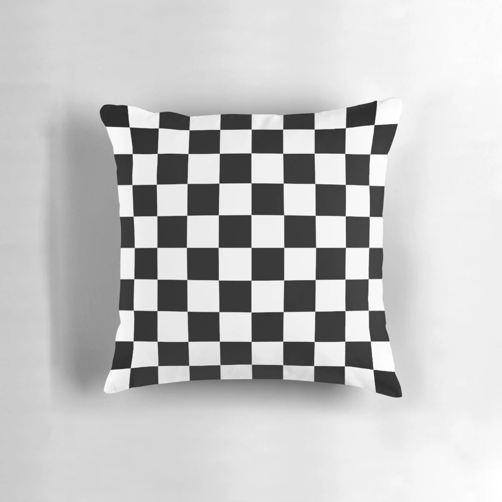 A black and white checkered pattern decorative throw pillow for the home.