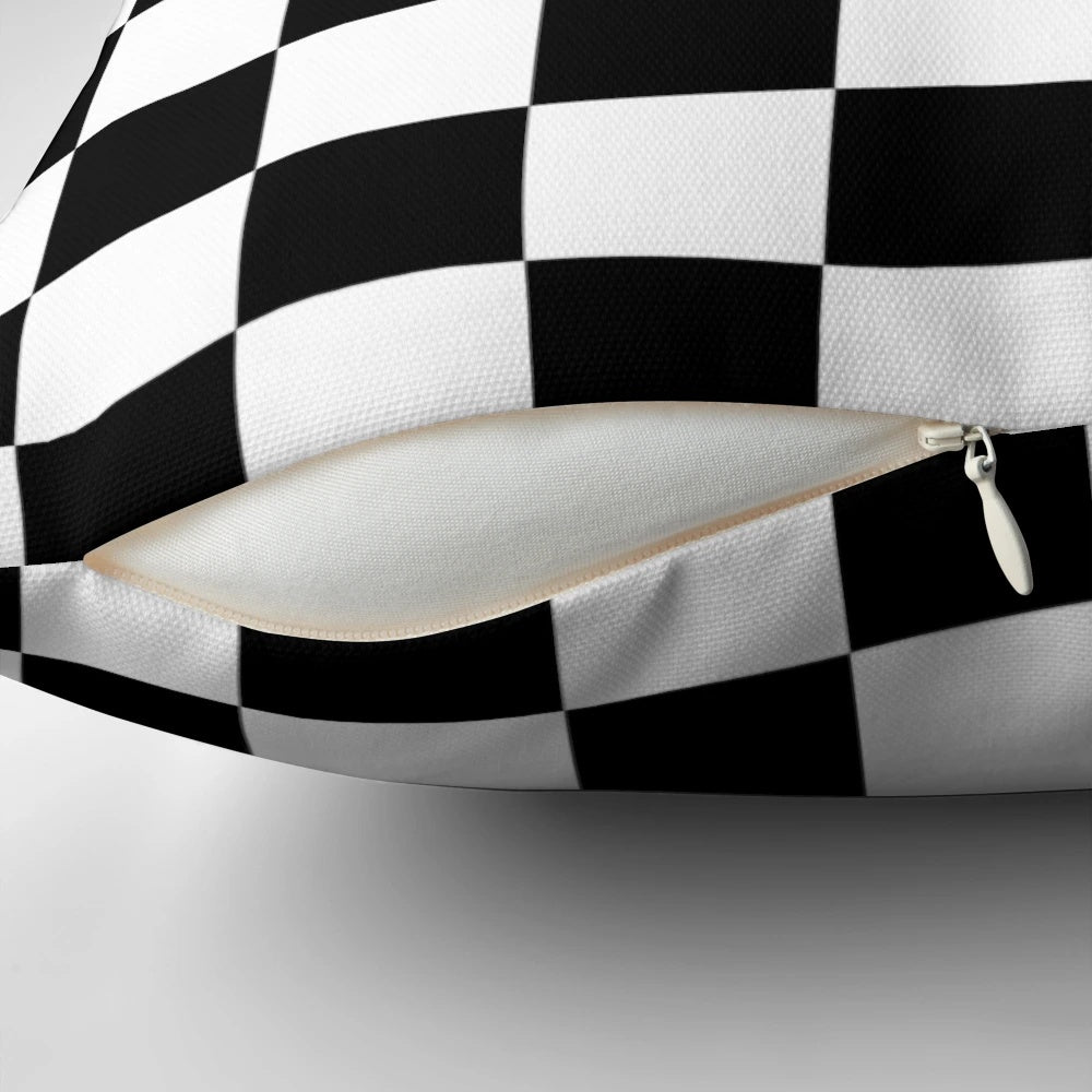 A black and white checkered pattern decorative throw pillow for the home.
