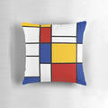 De Stijl-inspired pillow with bold primary color blocks and lines, celebrating Piet Mondrian's iconic abstract art.
