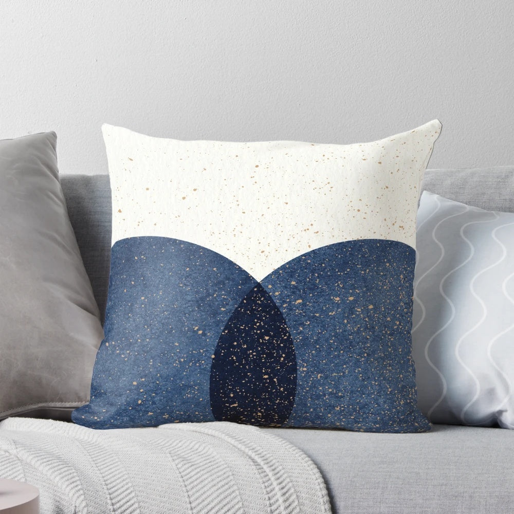 Navy blue abstract circle design on a textured throw pillow
