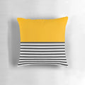 A modern, minimalist throw pillow featuring a half-striped gray and solid yellow design.