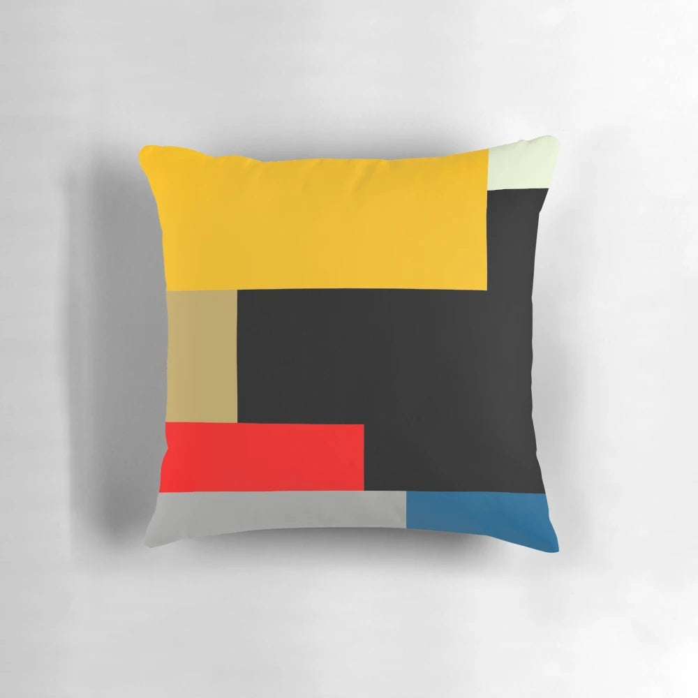 Modernist abstract geometric throw pillow with primary color palette