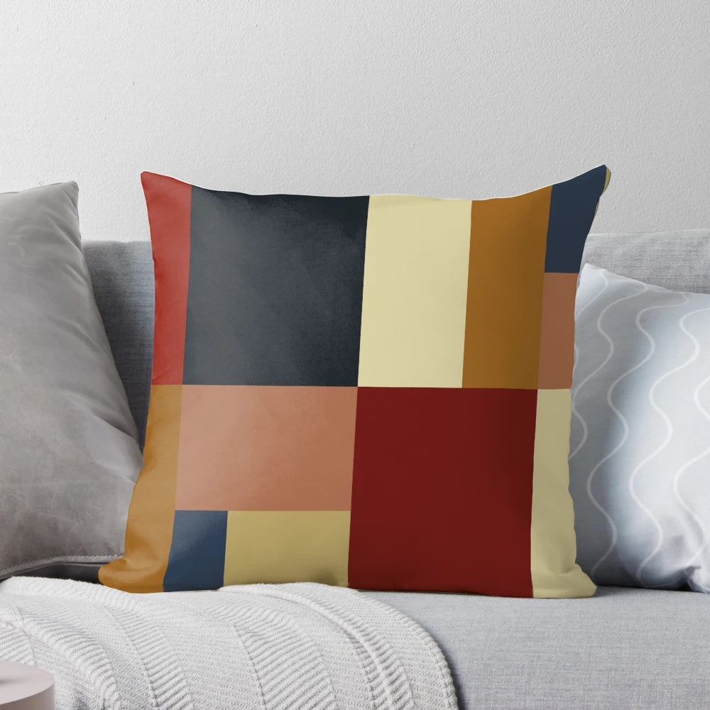 Bauhaus-inspired contemporary pillow with abstract geometric color blocks