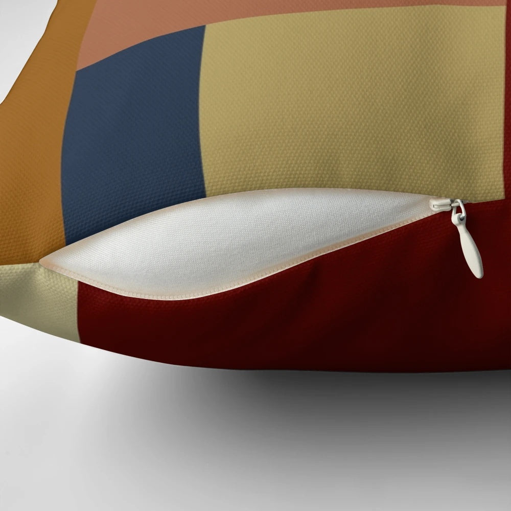 Bauhaus-inspired contemporary pillow with abstract geometric color blocks