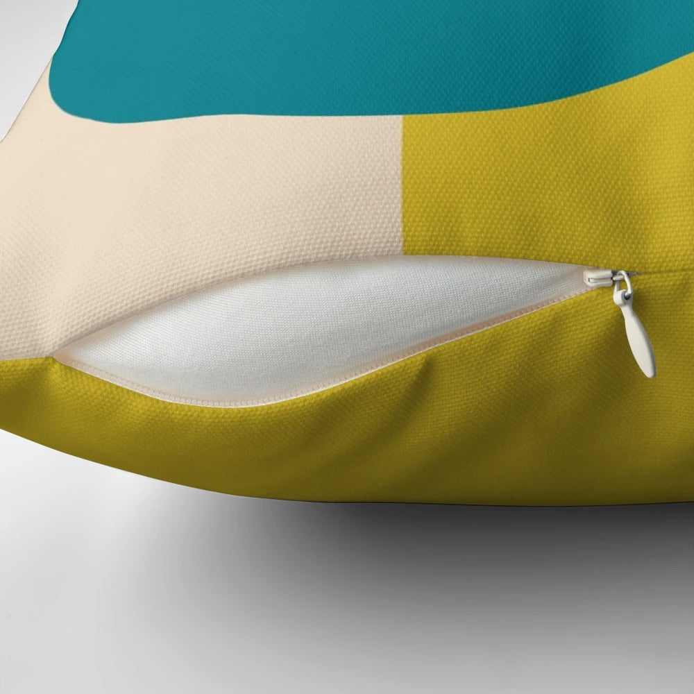 A black and white Bauhaus-style geometric minimalist pillow.