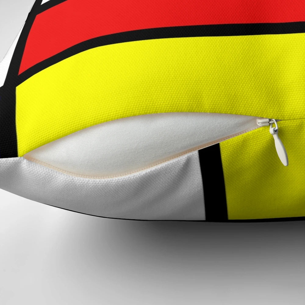 Vibrant red, blue, yellow, and white abstract art pillow with a Mondrian-inspired color block design