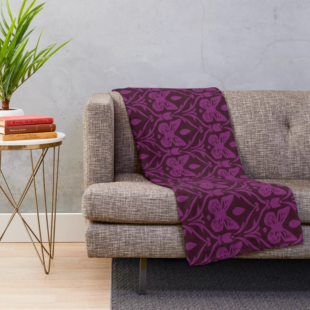 Monarch inspired plush blanket with purple and royal butterfly pattern