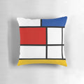Colorful geometric throw pillow with Mondrian-style abstract design in red, yellow, and blue