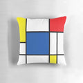 Mondrian-inspired geometric pillow with bold primary colors and intersecting lines, creating a modern abstract art piece.