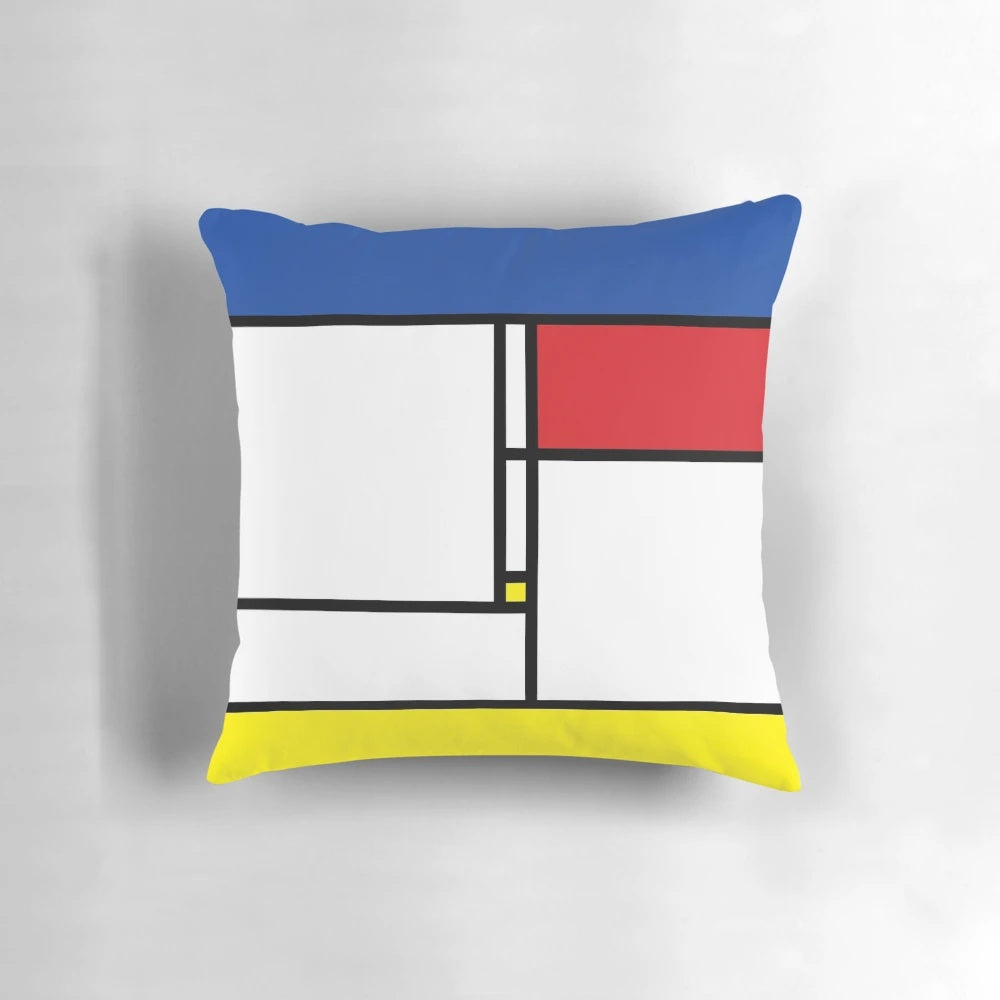 Colorful Mondrian-style abstract art pillow with geometric blocks and modern design elements.