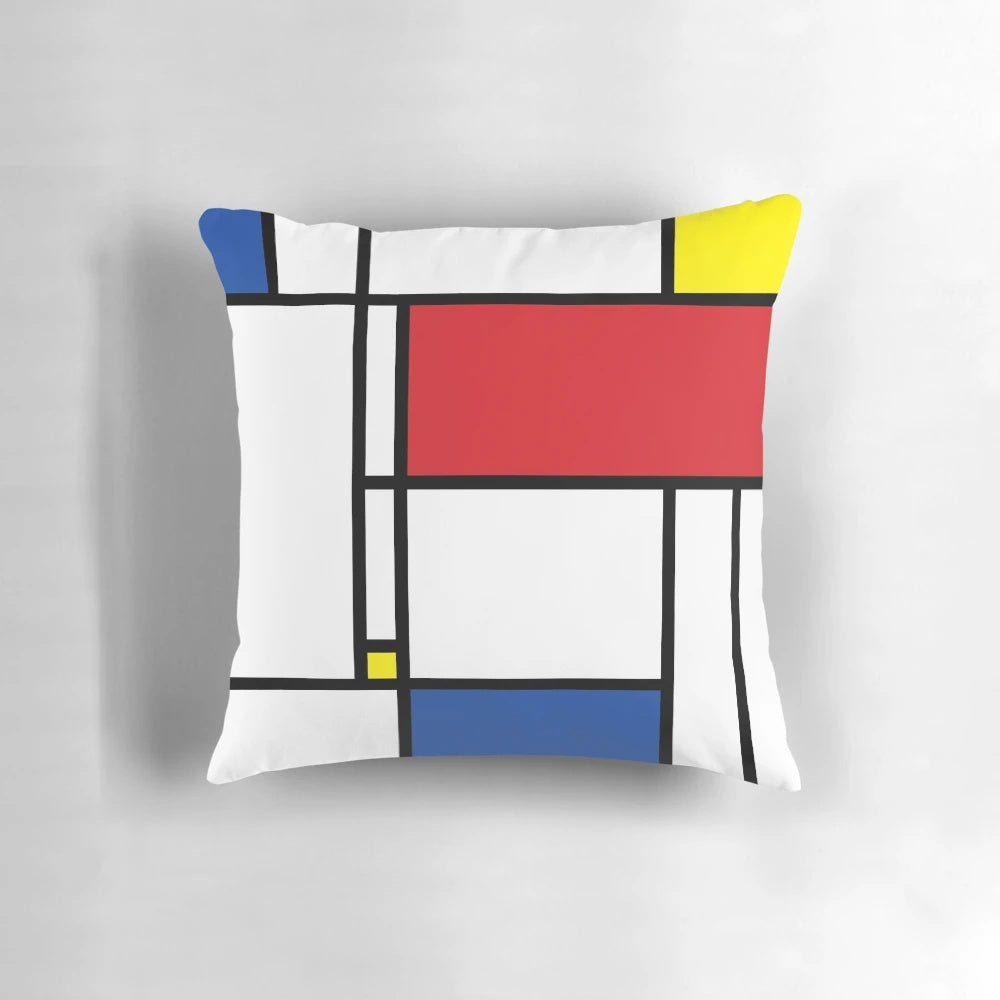 Mondrian-inspired minimalist abstract art pillow with bold geometric shapes and vibrant colors