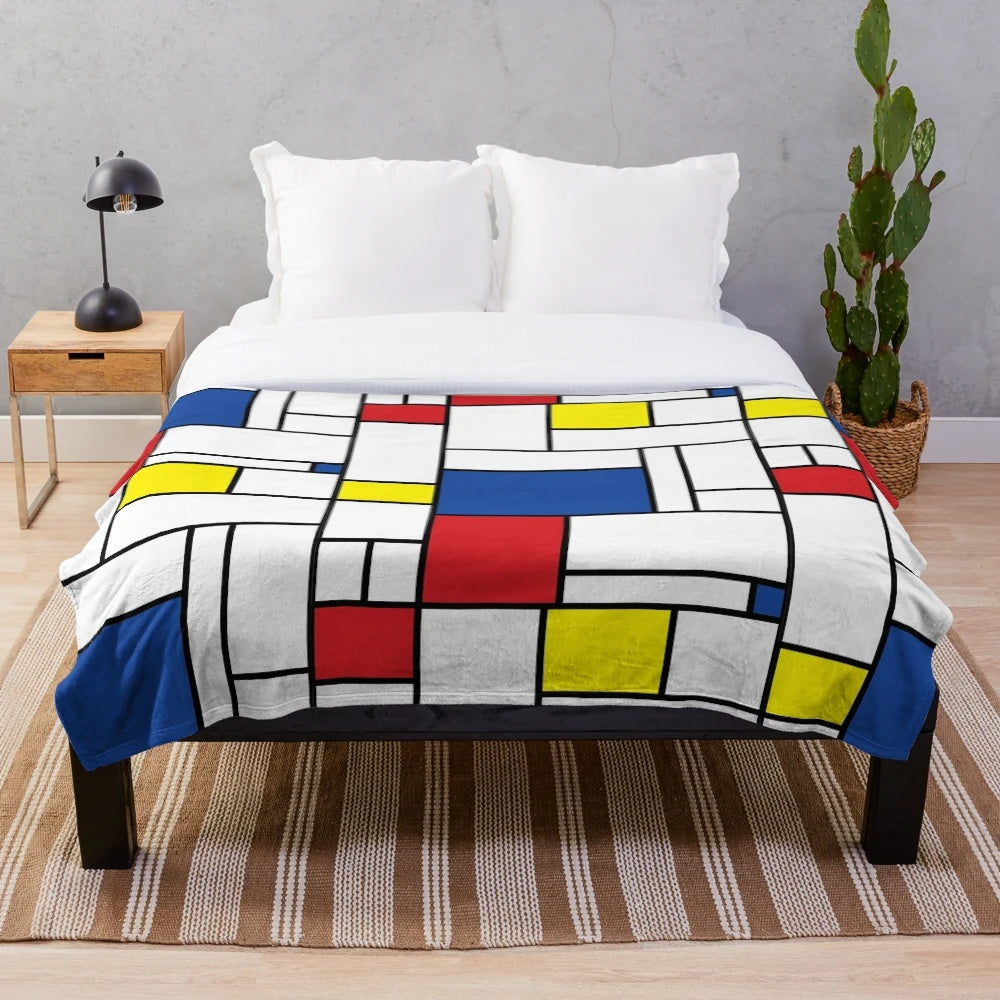 Mondrian-inspired minimalist plush blanket with abstract color block design