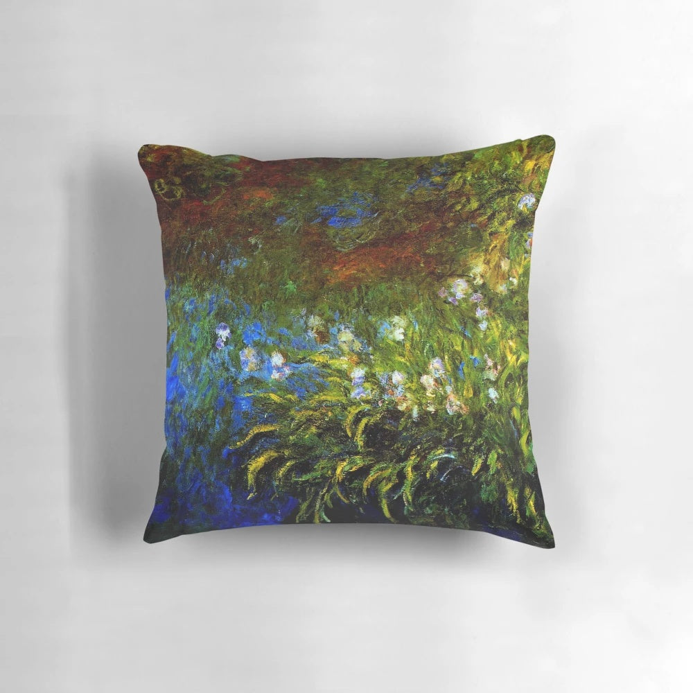 Monet inspired "Iris at the Sea-Rose Pond" floral throw pillow featuring a vibrant painting of irises by a pond