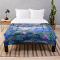 Monet water lilies plush blanket featuring the iconic impressionist painting