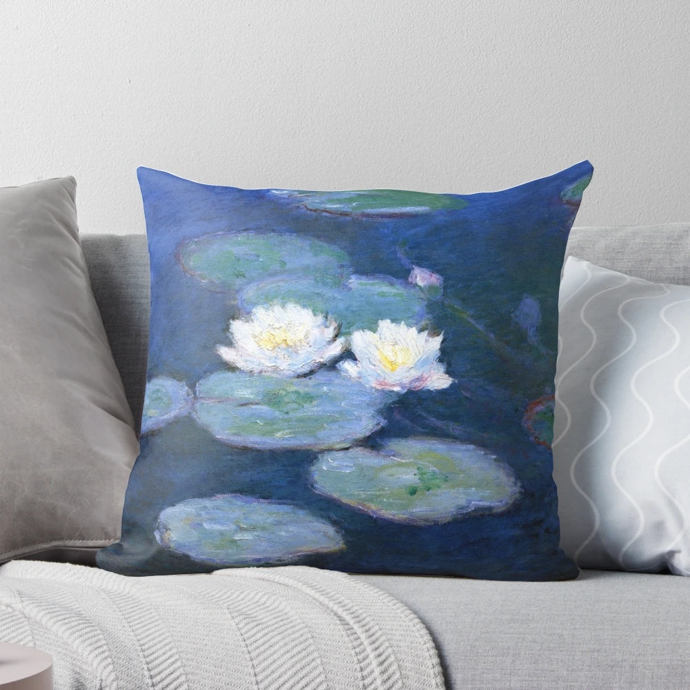 Decorative throw pillow featuring Monet's famous water lilies painting, showcasing the beauty of French Impressionist art.