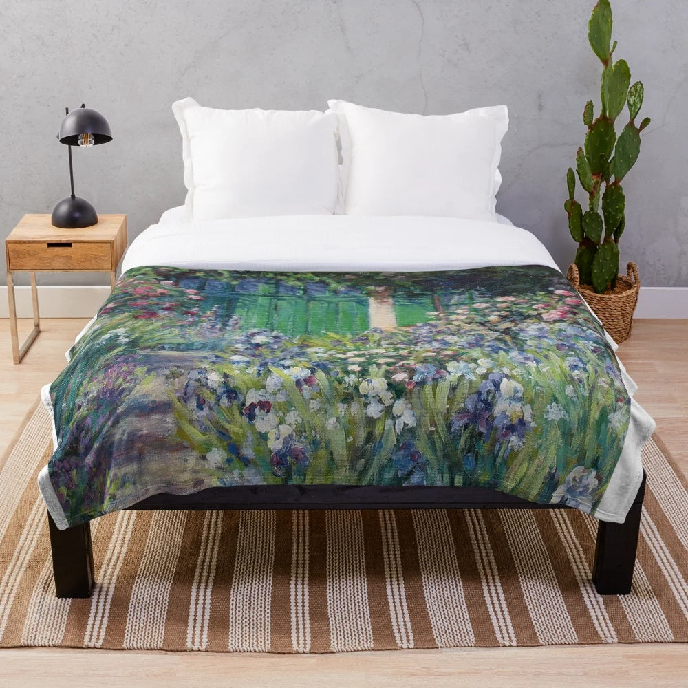 Monet's Garden Plush Blanket featuring a painting of the iconic garden path in Giverny, France