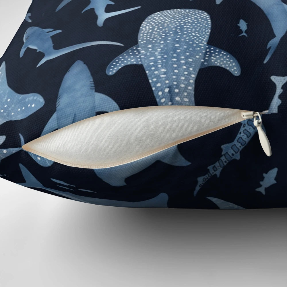 Monochrome blue watercolor image of a shark swimming in the ocean on a black background