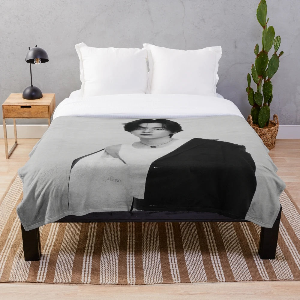 Monochrome plush blanket with the image of BTS member Suga, also known as his solo stage name Agust D.