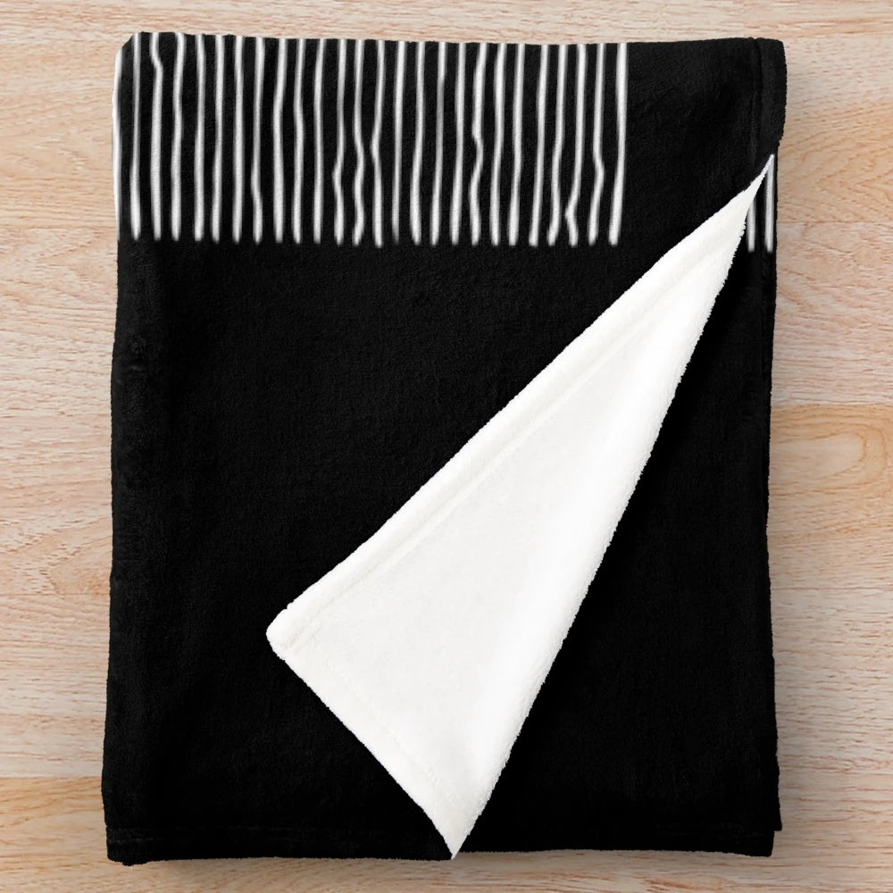 Monochrome plush blanket with 'Unknown Pleasures' album cover-inspired design