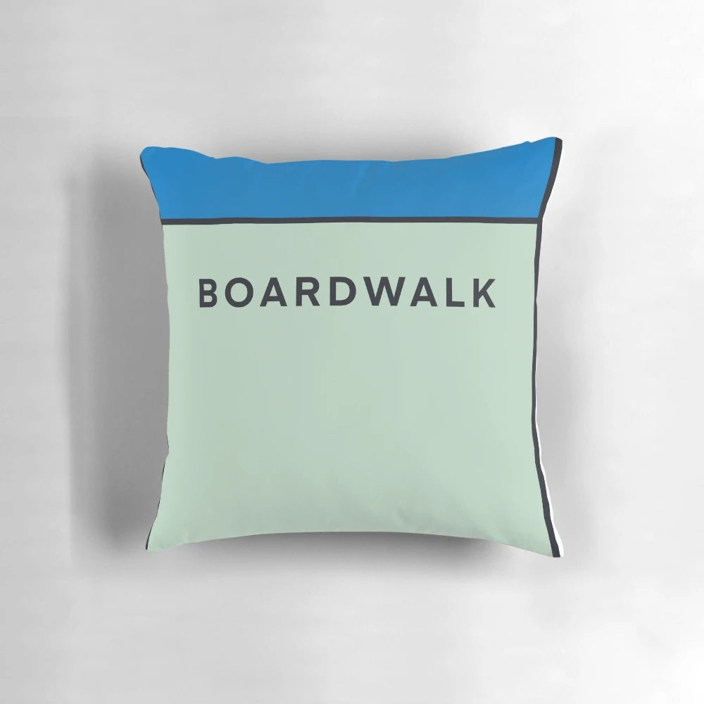 Vibrant and whimsical Monopoly-themed pillow featuring the iconic Board Walk design