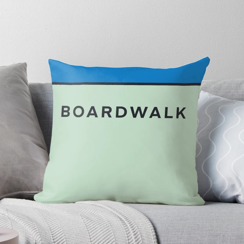 Vibrant and whimsical Monopoly-themed pillow featuring the iconic Board Walk design