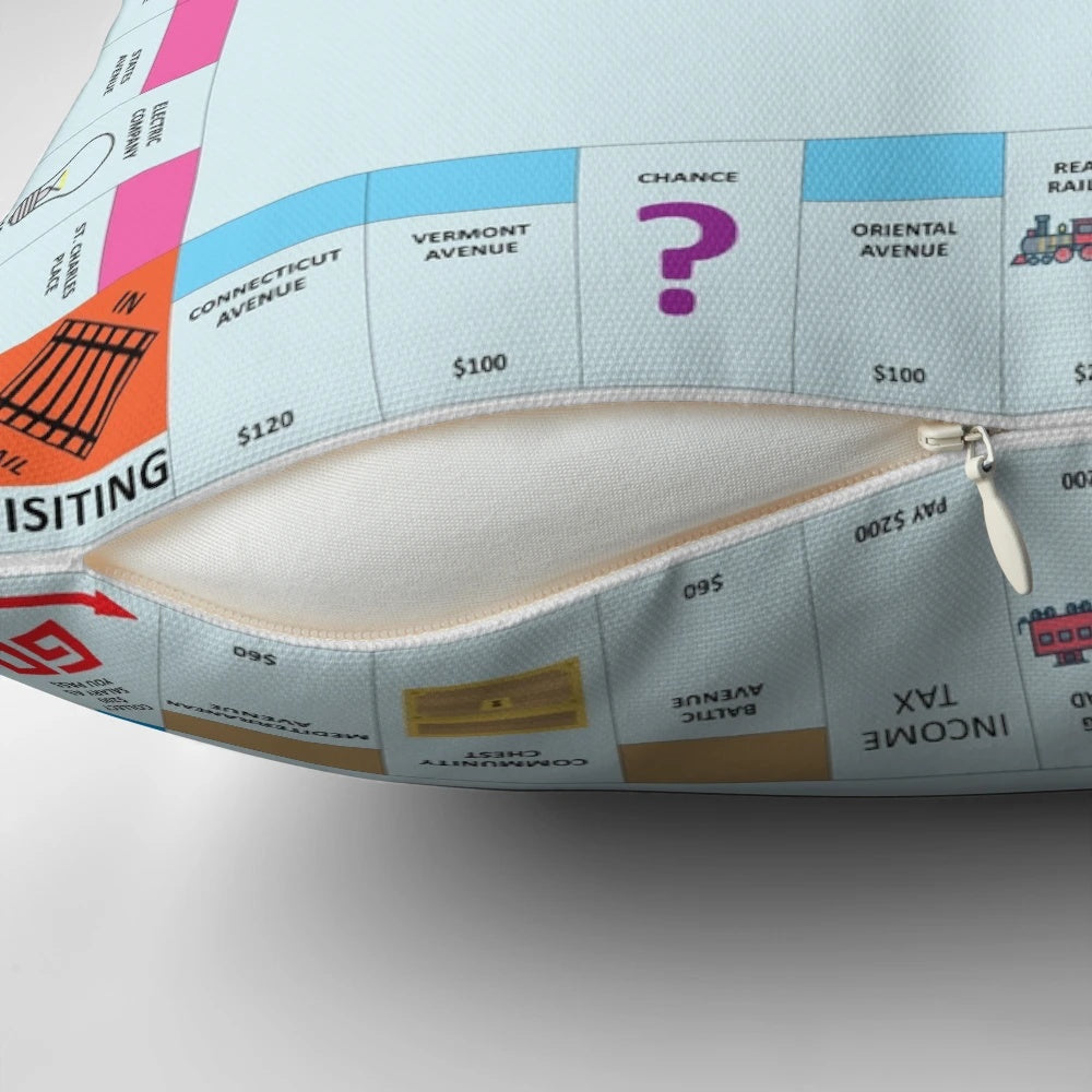 A cozy and whimsical pillow featuring the iconic Monopoly board game design