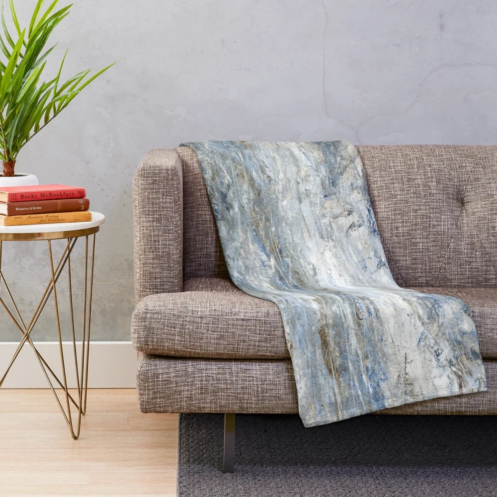 Plush blanket featuring a moody abstract seascape painting in shades of grey and blue