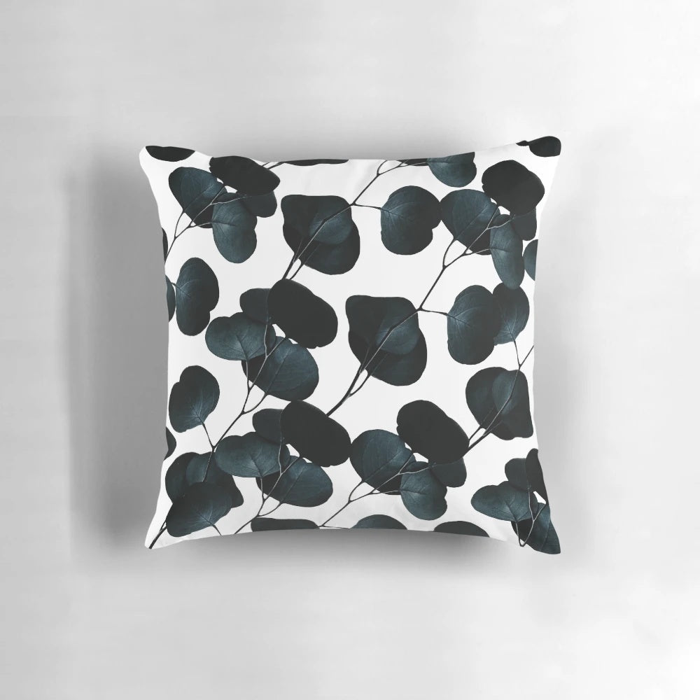 Dramatic black and white digital painting of lush, dark leaves against a contrasting background
