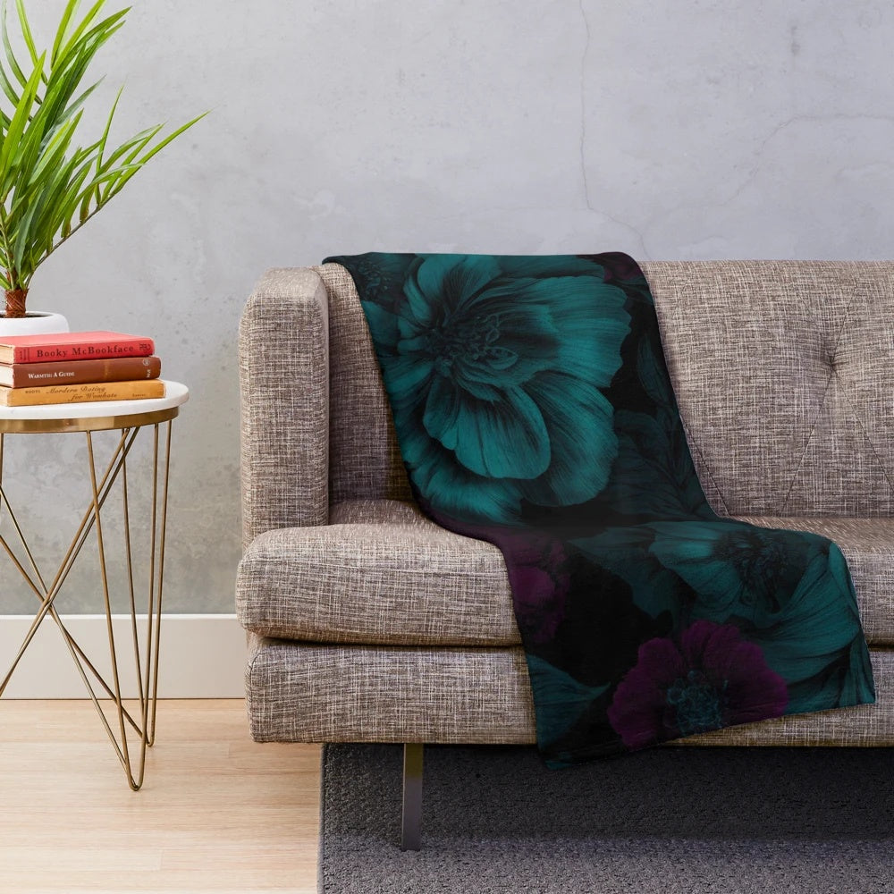 Moody floral design plush blanket with dark, dramatic flower patterns and gothic botanical illustrations