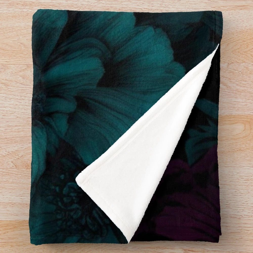 Moody floral design plush blanket with dark, dramatic flower patterns and gothic botanical illustrations