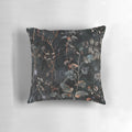 Moody gothic boho style throw pillow with a botanical foliage and celestial design