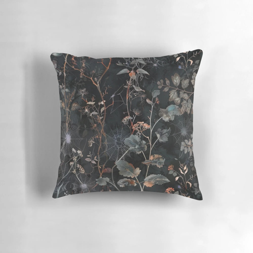 Moody gothic boho style throw pillow with a botanical foliage and celestial design
