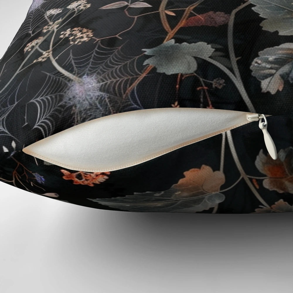 Moody gothic boho style throw pillow with a botanical foliage and celestial design
