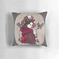 Moody, dark gothic-style pillow with a skull and bat design