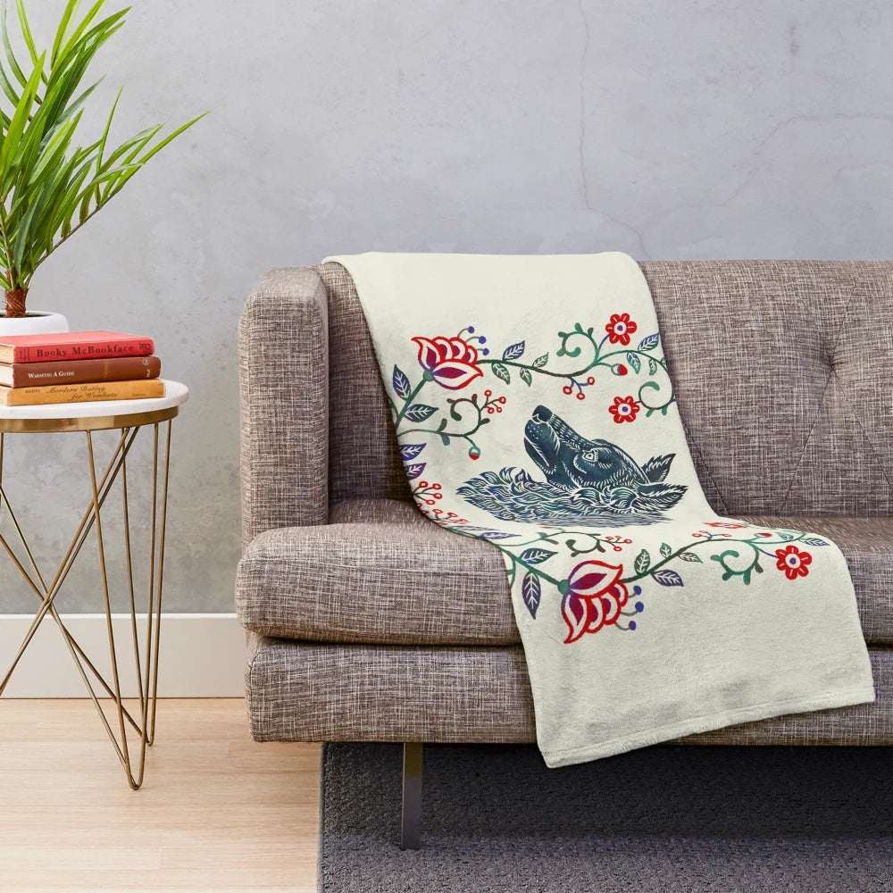 A vibrant plush blanket featuring a graphic design of a Mudi dog in a folk art style wreath