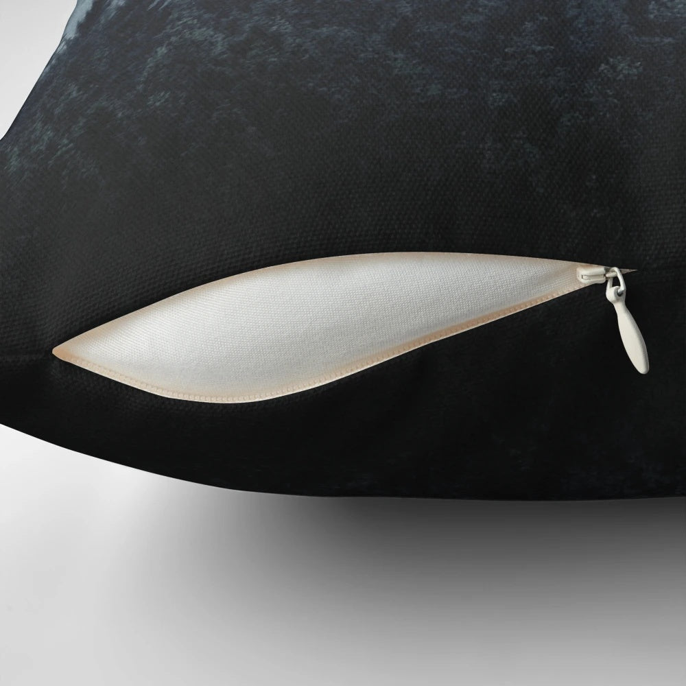 A dark and moody pillow featuring a watercolor-style illustration of a foggy forest with Cascadia trees.