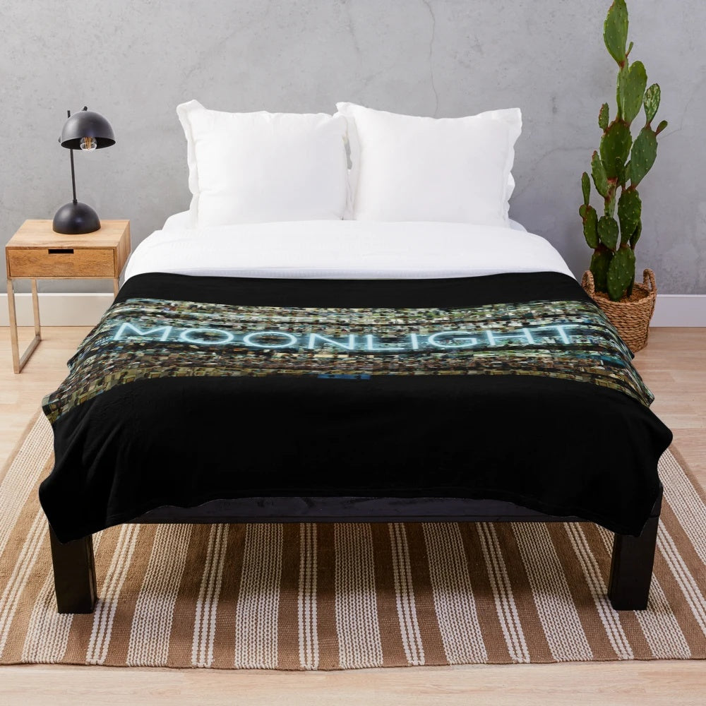 Moonlight-inspired plush blanket with film frames design