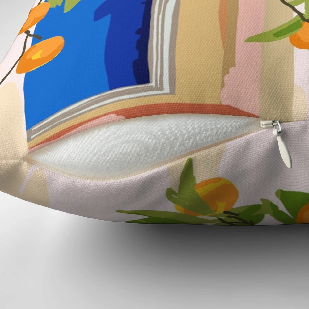A vibrant, boho-style decorative pillow featuring an architectural building and orange botanical patterns, perfect for a Moroccan-inspired or travel-themed home.
