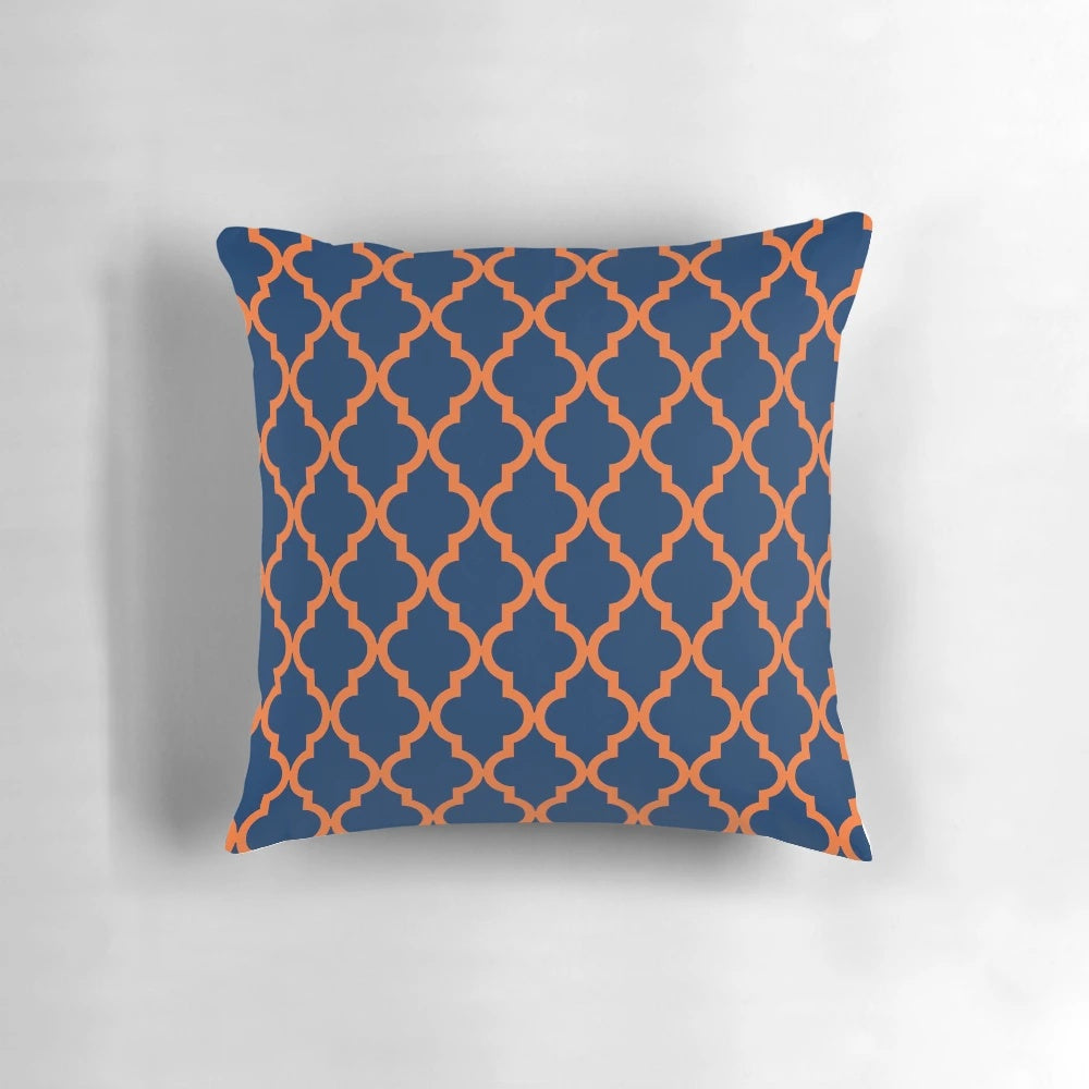 Decorative Moroccan-style pillow in orange and navy blue colors