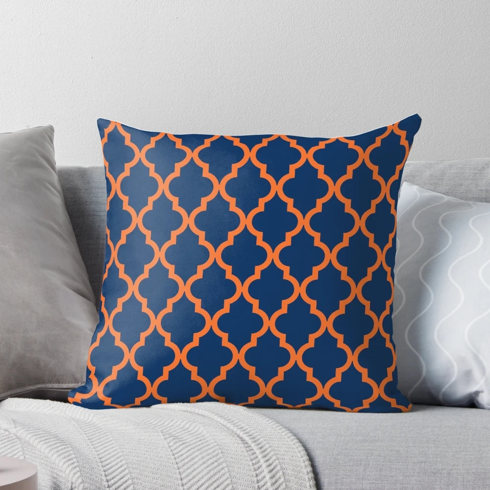 Decorative Moroccan-style pillow in orange and navy blue colors