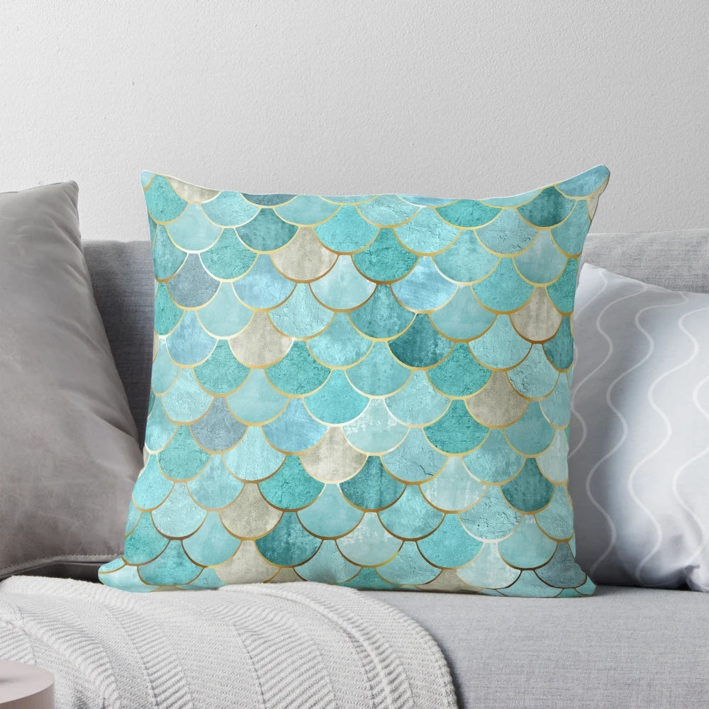 Moroccan-inspired mermaid fish scale pattern in teal and aqua colors on a decorative throw pillow.