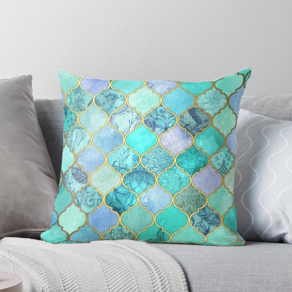 Decorative Moroccan tile pattern throw pillow in mint green, jade, and gold colors with a watercolor bird design.