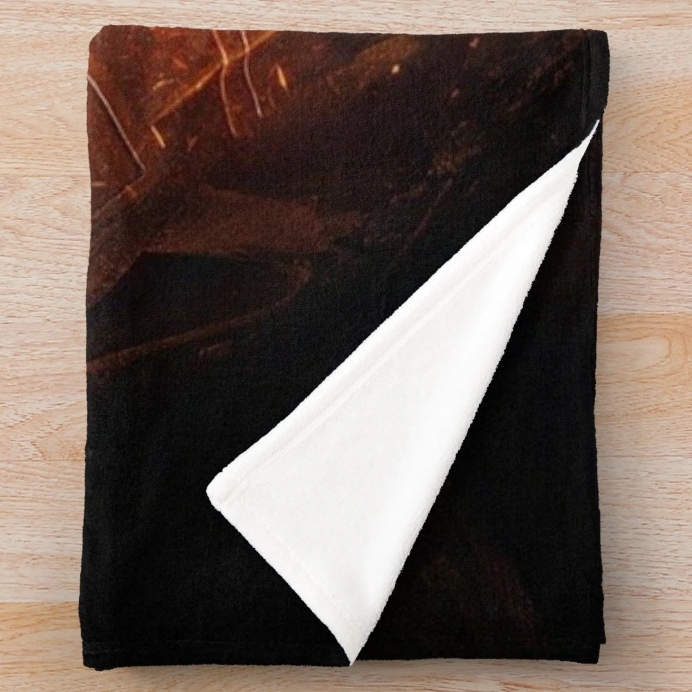 Mortal Kombat-inspired plush blanket featuring the game's iconic characters and symbols