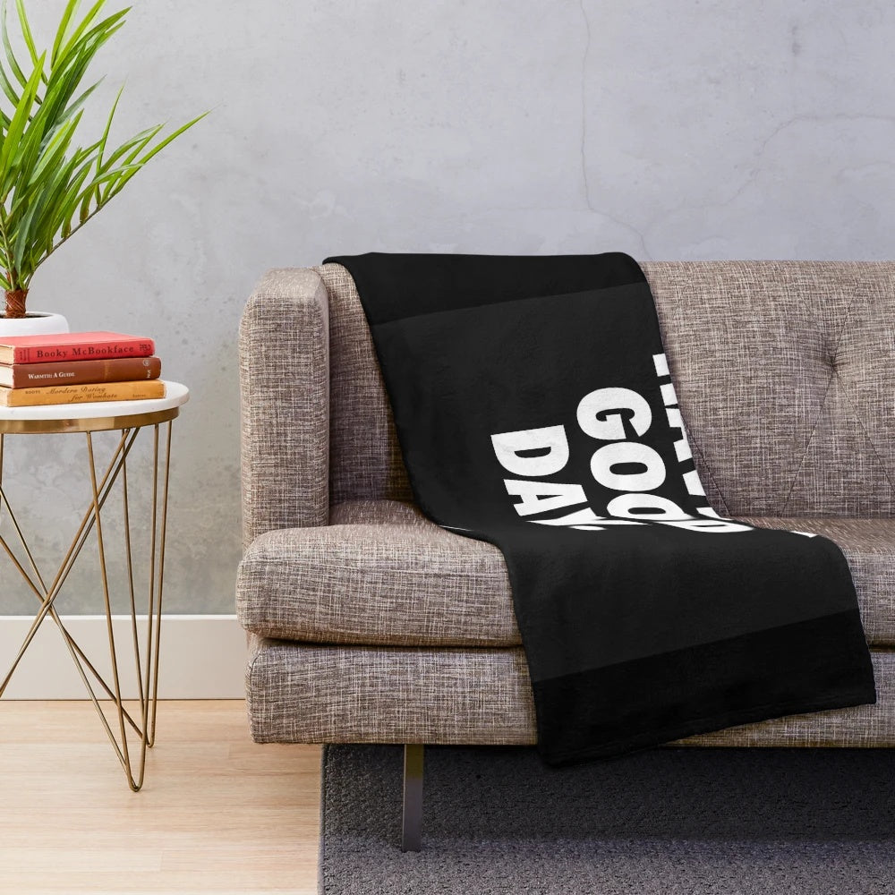 Black plush blanket with motivational art design inspired by Nike
