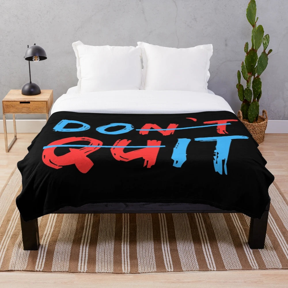 Motivational "Don't Quit" plush blanket with inspirational message