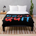 Motivational "Don't Quit" plush blanket with inspirational message