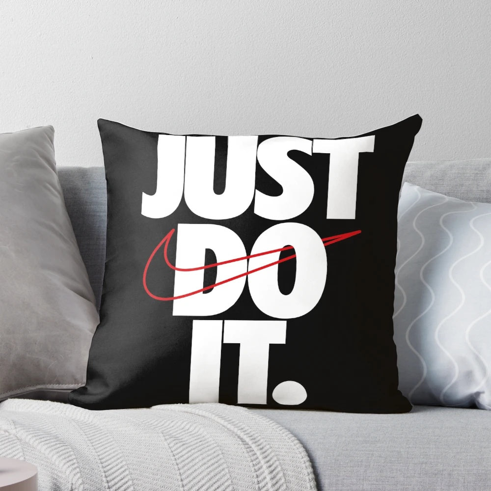 Just Do It" Nike-inspired sports-themed decorative pillow with bold lettering