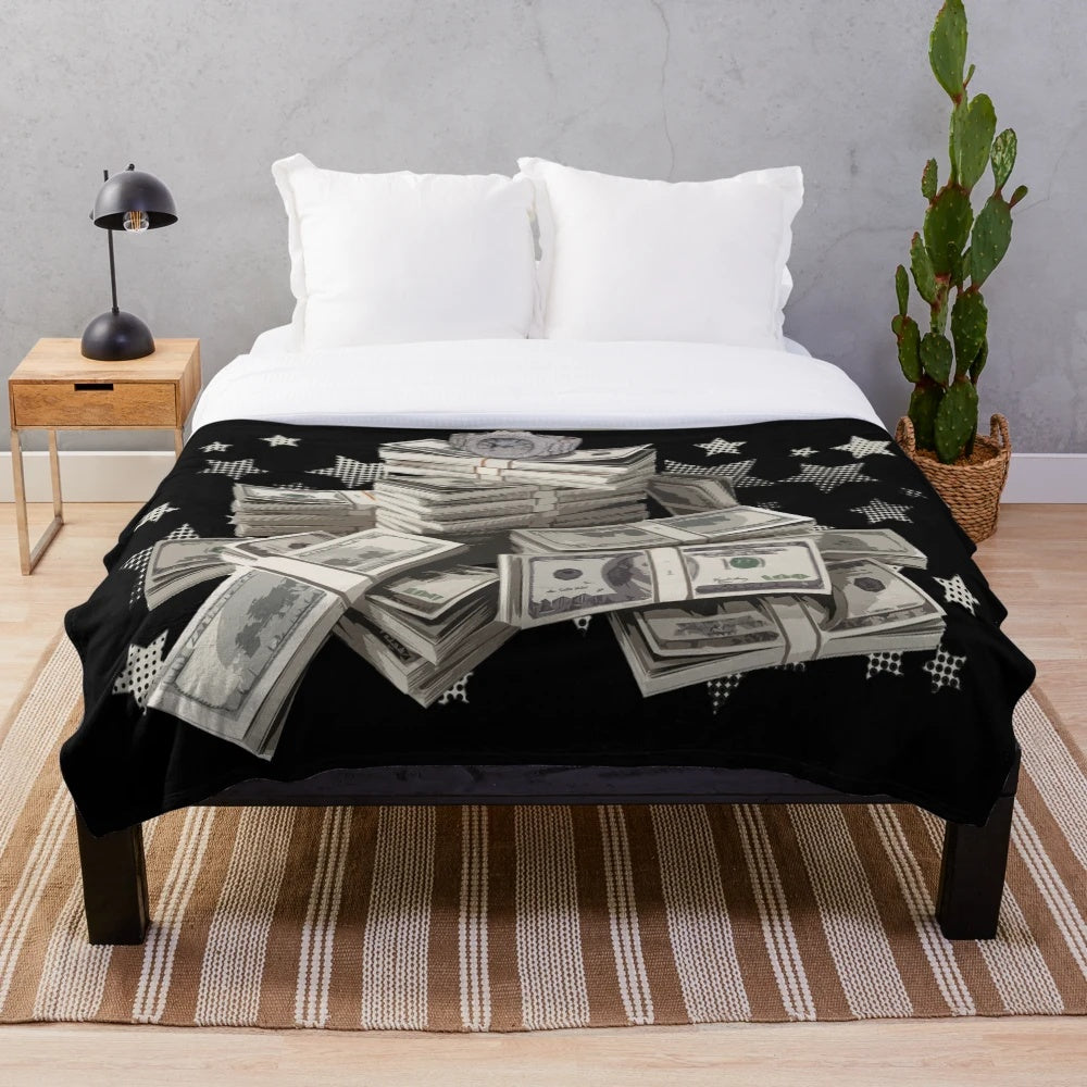 Plush blanket with dollar bill design, featuring a motivational money-themed pattern