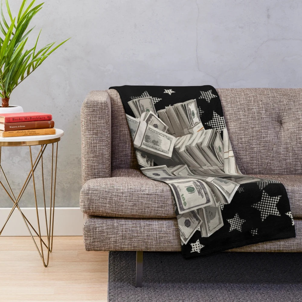 Plush blanket with dollar bill design, featuring a motivational money-themed pattern
